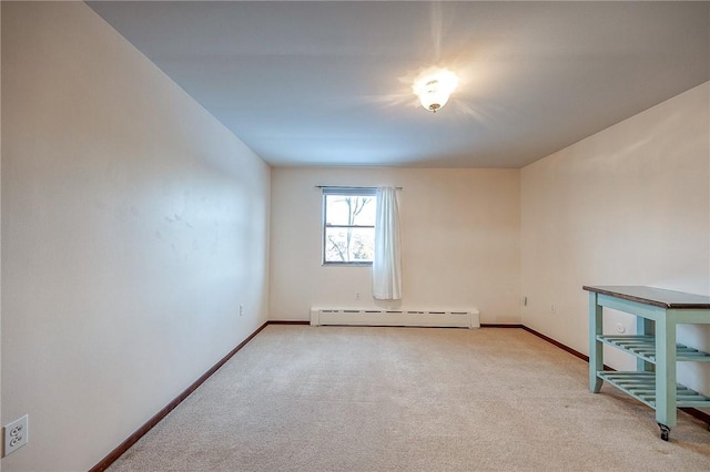 248 Spruceton Ave, Mt Lebanon, PA 15228 - empty room featuring a baseboard radiator, baseboards, and light carpet