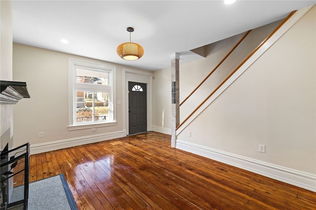 927 Greenfield Ave, Greenfield, PA 15217 - entrance foyer with recessed lighting, a fireplace, baseboards, and wood-type flooring