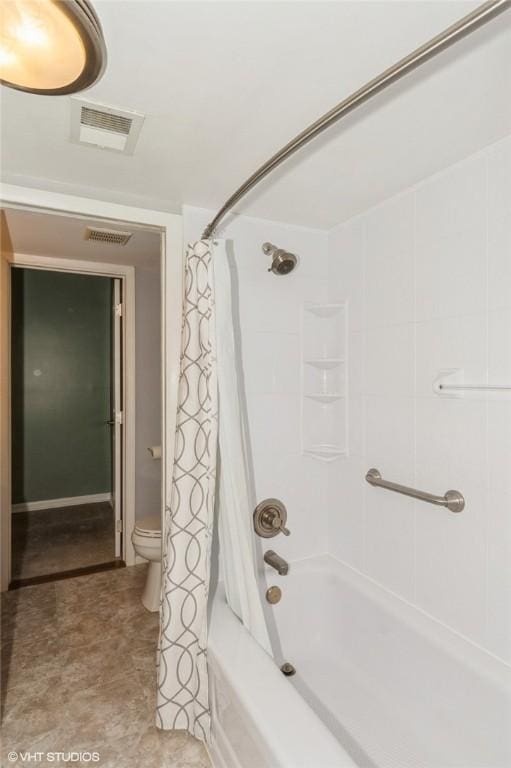 bathroom with toilet, shower / bath combo, and visible vents