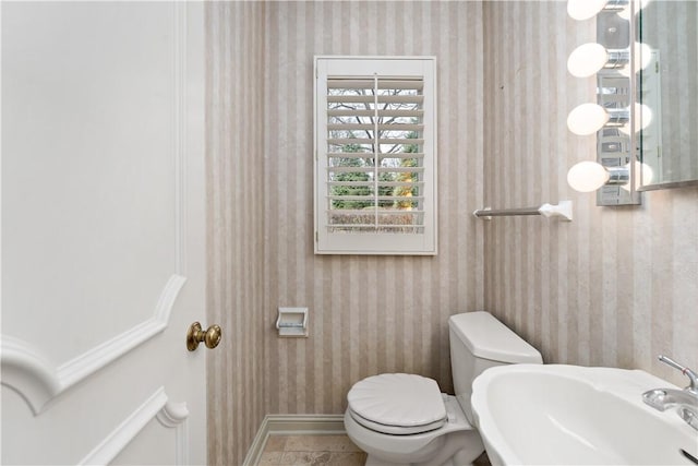 2172 Hycroft Dr, Upper St Clair, PA 15241 - half bathroom with wallpapered walls, toilet, a sink, and baseboards