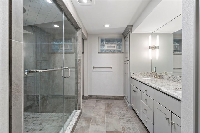 2172 Hycroft Dr, Upper St Clair, PA 15241 - bathroom with baseboards, a shower stall, double vanity, and recessed lighting