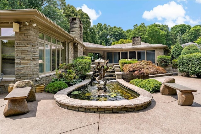 2172 Hycroft Dr, Upper St Clair, PA 15241 - view of yard with a garden pond and a patio