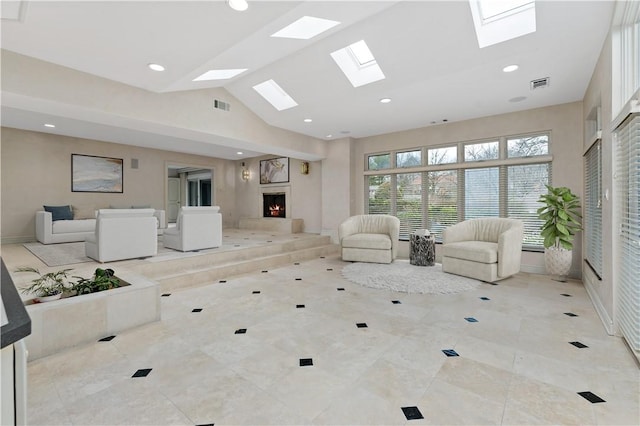 2172 Hycroft Dr, Upper St Clair, PA 15241 - living room featuring a warm lit fireplace, a skylight, lofted ceiling, and recessed lighting