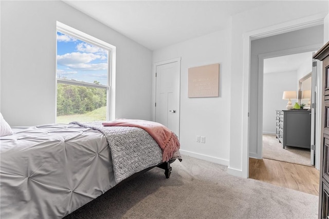 121 Samantha Dr, Center Twp, PA 15061 - bedroom with baseboards and light carpet