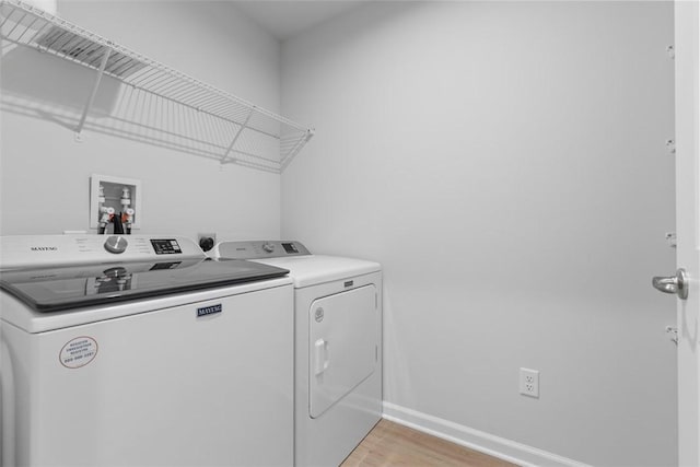130 Arnoni Dr, Jefferson Hills, PA 15025 - washroom with washing machine and clothes dryer, baseboards, and light wood finished floors