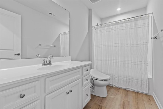 130 Arnoni Dr, Jefferson Hills, PA 15025 - bathroom featuring vanity, toilet, wood finished floors, a shower with curtain, and recessed lighting