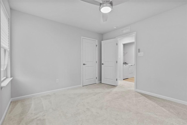 130 Arnoni Dr, Jefferson Hills, PA 15025 - unfurnished bedroom featuring light colored carpet, washing machine and clothes dryer, and baseboards