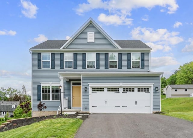 130 Arnoni Dr, Jefferson Hills, PA 15025 - view of front facade with driveway, a front lawn, and an attached garage