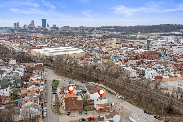 birds eye view of property with a view of city