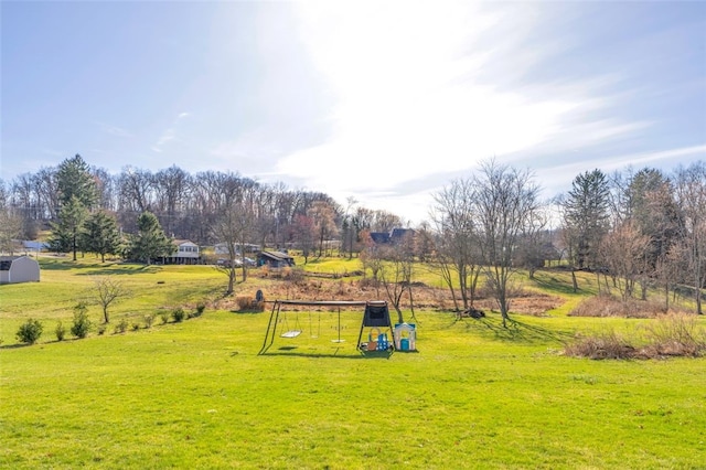 view of yard with a playground