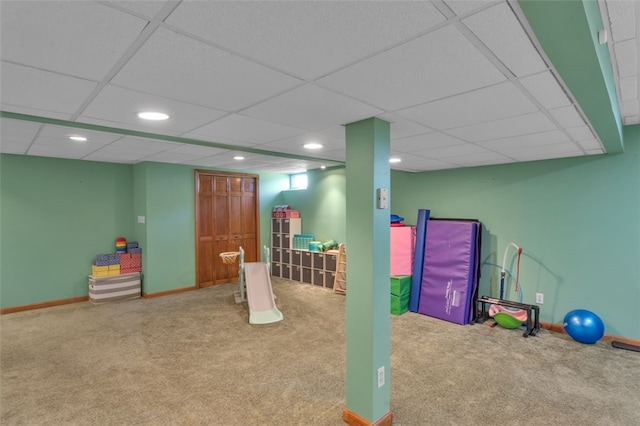 rec room with recessed lighting, baseboards, carpet floors, and a paneled ceiling