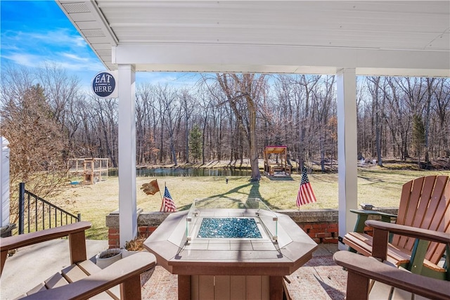 260 Stouffer Hill Rd, Somerset Twp, PA 15541 - view of yard with a patio area, a water view, and an outdoor fire pit