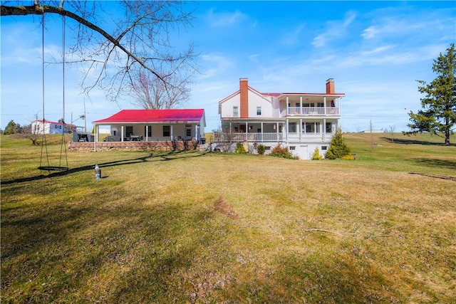 260 Stouffer Hill Rd, Somerset Twp, PA 15541 - back of property with a yard and a chimney