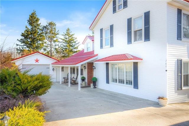 260 Stouffer Hill Rd, Somerset Twp, PA 15541 - view of front of property with metal roof and a garage