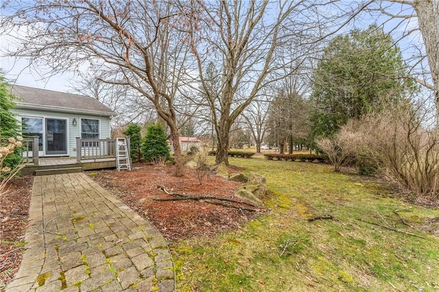 view of yard featuring a deck