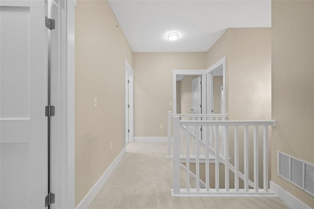 1223 Center Ave, West View, PA 15229 - hallway with carpet flooring, an upstairs landing, visible vents, and baseboards