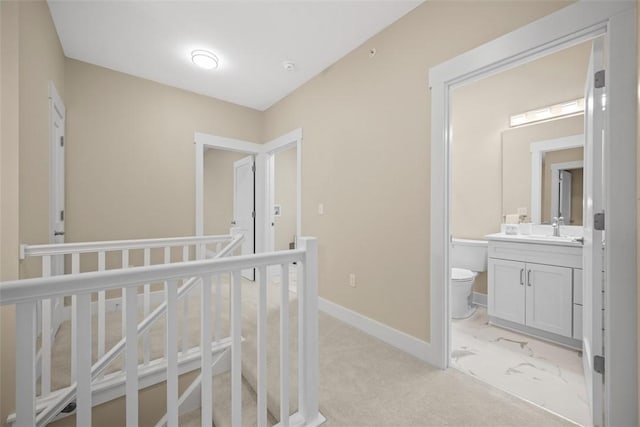 1223 Center Ave, West View, PA 15229 - hall featuring light carpet, an upstairs landing, baseboards, and a sink