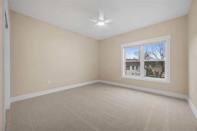1223 Center Ave, West View, PA 15229 - empty room featuring light carpet, ceiling fan, and baseboards