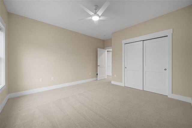 1223 Center Ave, West View, PA 15229 - unfurnished bedroom featuring a closet, baseboards, light colored carpet, and a ceiling fan