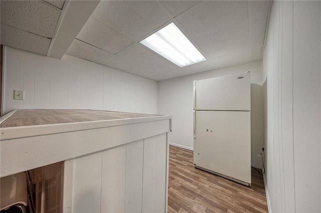 159 Mardi Gras Dr, Plum Boro, PA 15239 - kitchen featuring a drop ceiling, freestanding refrigerator, and wood finished floors