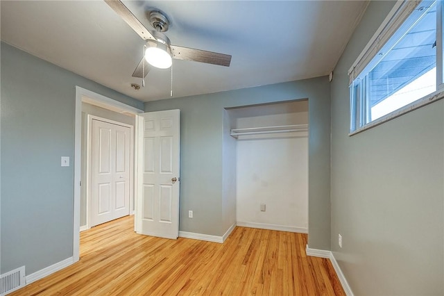 159 Mardi Gras Dr, Plum Boro, PA 15239 - unfurnished bedroom featuring light wood finished floors, visible vents, and baseboards