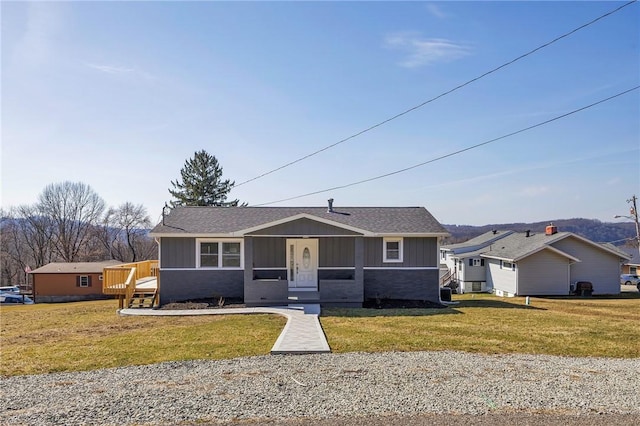 667 Memorial Dr, Plum Boro, PA 15068 - bungalow-style home with board and batten siding, a front lawn, a wooden deck, and roof with shingles