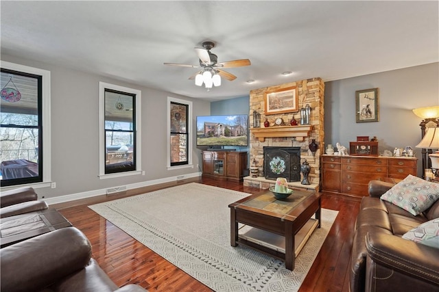 123 Windermere Ct, Peters Twp, PA 15317 - living room with dark wood-style floors, a fireplace, a ceiling fan, and baseboards