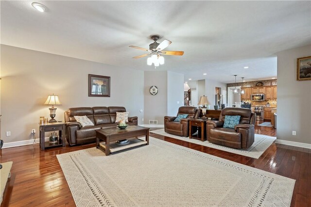123 Windermere Ct, Peters Twp, PA 15317 - living room with dark wood-style floors, baseboards, ceiling fan, and recessed lighting