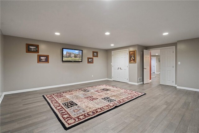 123 Windermere Ct, Peters Twp, PA 15317 - below grade area with recessed lighting, wood finished floors, and baseboards