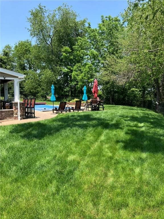 123 Windermere Ct, Peters Twp, PA 15317 - view of green lawn featuring an outdoor pool and a patio