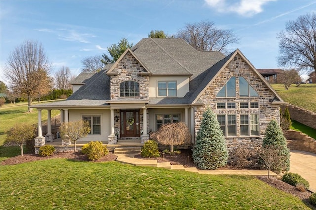 105 Concord Pl, South Union Twp, PA 15401 - view of front of home featuring stone siding, stucco siding, a shingled roof, and a front yard
