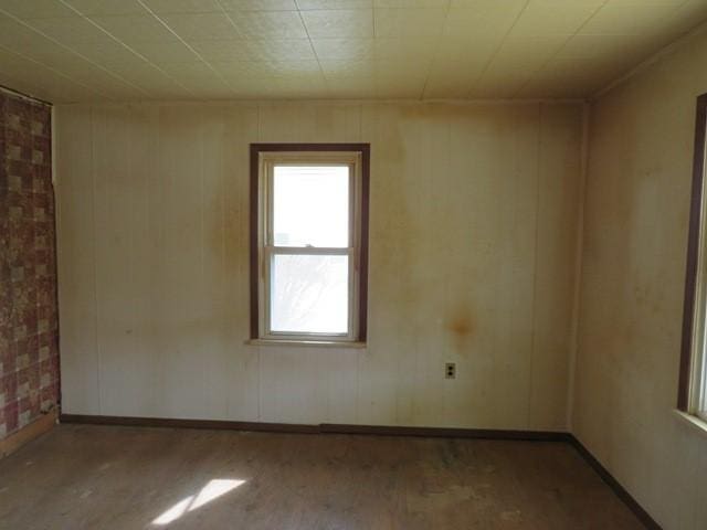 501 Adams St, West Newton, PA 15089 - empty room featuring wood finished floors and wood walls
