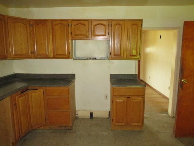 501 Adams St, West Newton, PA 15089 - kitchen featuring brown cabinets and dark countertops