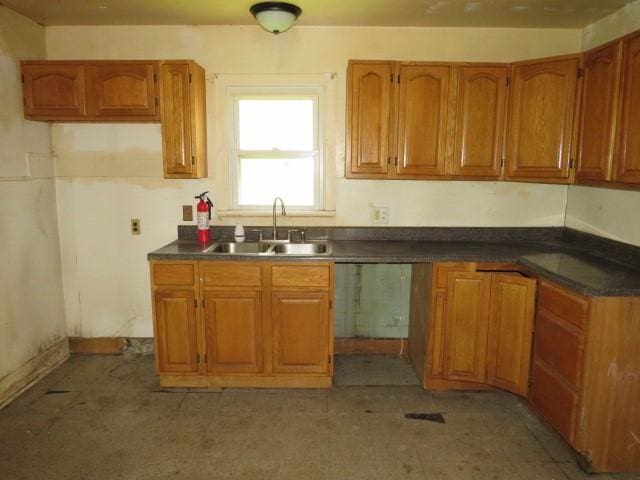 501 Adams St, West Newton, PA 15089 - kitchen with brown cabinets and dark countertops