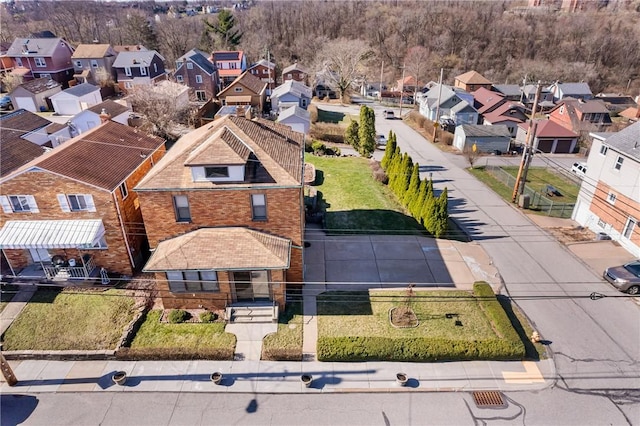 birds eye view of property with a residential view