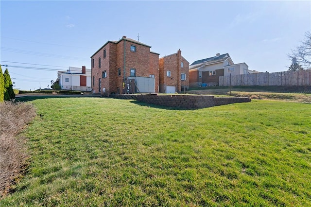view of yard with fence