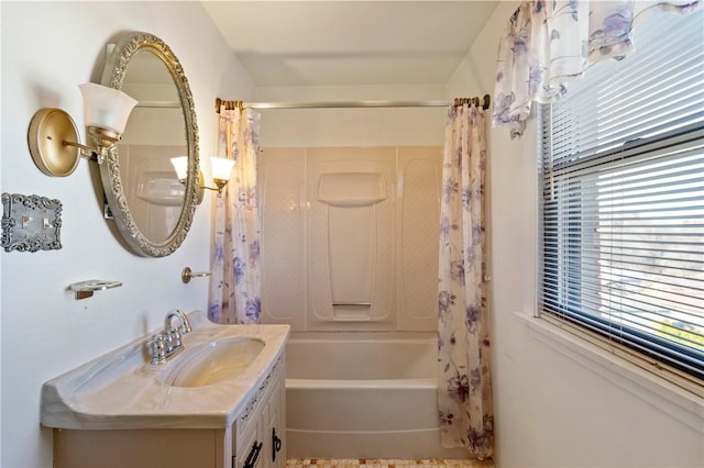 full bath with shower / tub combo with curtain and vanity