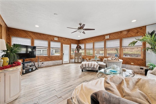 19 Misty Meadows Ln, Menallen Twp, PA 15401 - living area featuring wood walls, a ceiling fan, wood finished floors, and recessed lighting