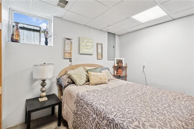 19 Misty Meadows Ln, Menallen Twp, PA 15401 - bedroom featuring a drop ceiling, electric panel, and wood finished floors