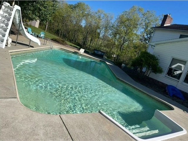 19 Misty Meadows Ln, Menallen Twp, PA 15401 - outdoor pool featuring a water slide, a patio, and a diving board
