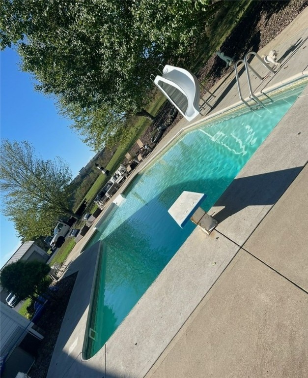 19 Misty Meadows Ln, Menallen Twp, PA 15401 - view of swimming pool with a water slide and a diving board