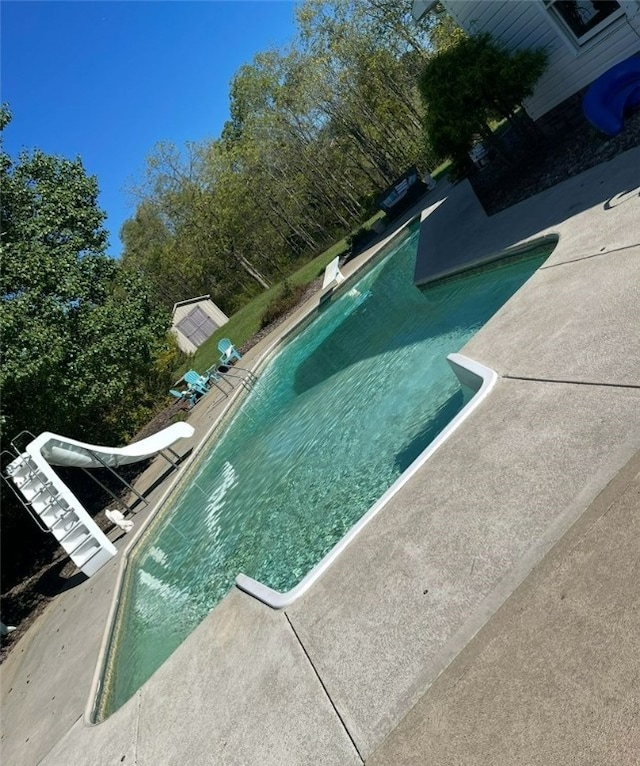 19 Misty Meadows Ln, Menallen Twp, PA 15401 - outdoor pool with a water slide and a patio area
