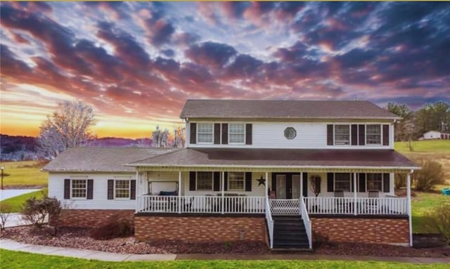 19 Misty Meadows Ln, Menallen Twp, PA 15401 - view of front of home with a porch, stairs, and a front yard