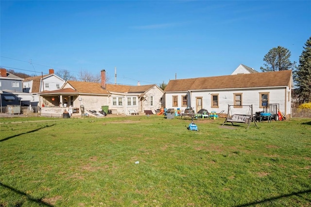 1101 11th St, Stowe Twp, PA 15136 - rear view of property featuring a lawn and a chimney