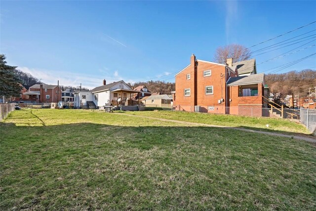 1114 11th St, Stowe Twp, PA 15136 - view of yard featuring a residential view and fence