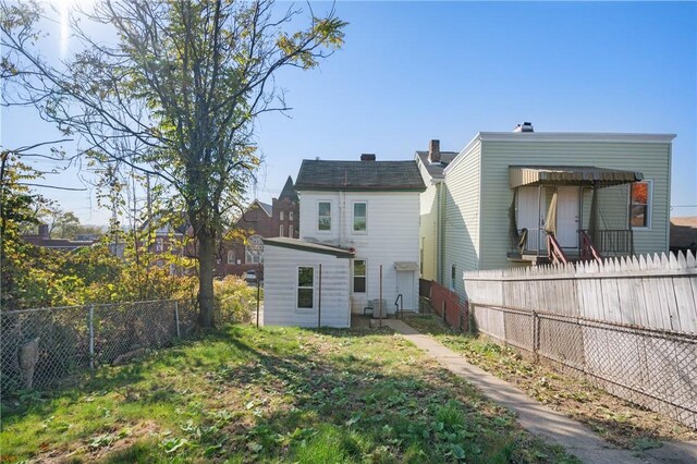 2219 Arlington Ave, South Side, PA 15210 - rear view of property with a fenced backyard