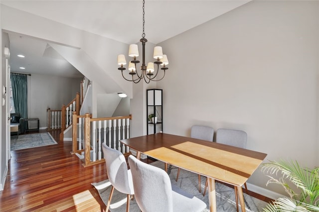 2802 Jane St, South Side, PA 15203 - dining area with a chandelier, wood finished floors, and baseboards