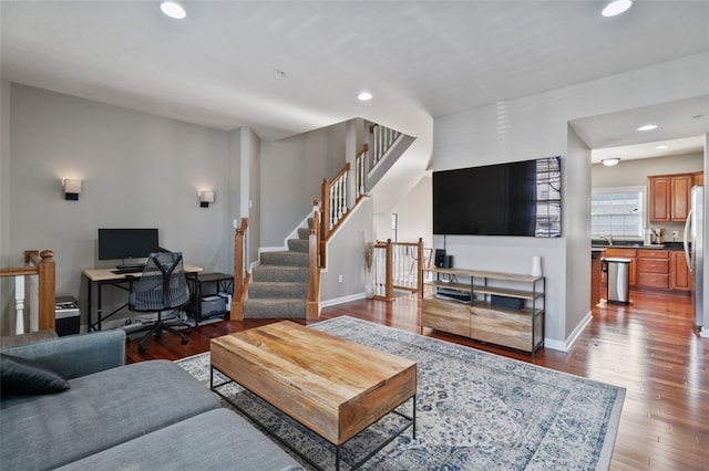 2802 Jane St, South Side, PA 15203 - living room with recessed lighting, wood finished floors, stairs, baseboards, and a desk