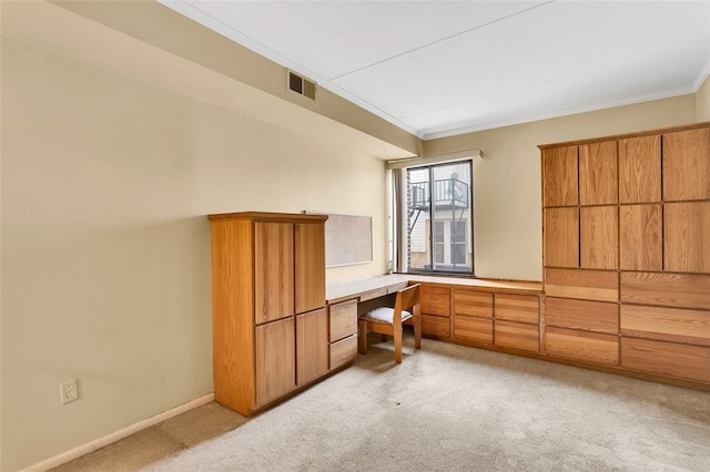 5841 Morrowfield Ave Unit 104, Squirrel Hill, PA 15217 - bedroom featuring visible vents, crown molding, baseboards, built in desk, and light carpet