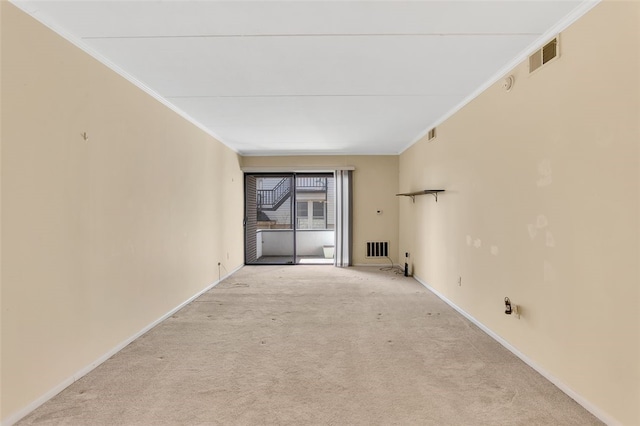 5841 Morrowfield Ave Unit 104, Squirrel Hill, PA 15217 - unfurnished living room with carpet, visible vents, and crown molding